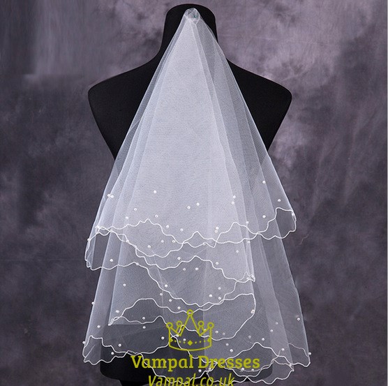 Einlagiger Hochzeitsschleier in Ellbogenlänge mit Engelschnitt und Kunstperlen
