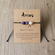 Handgefertigtes gewebtes Kordel-Sternzeichen-Armband mit Naturstein-Kristall