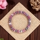 Rosa Zebra-Kristall-Perlenarmband mit Abakus-Perlen