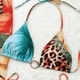 As shown in the picture Leopard Print Three-Piece Bikini Set With Backless Long Dress
