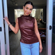 Sleeveless Leather Vest With Stand Collar And Cinched Waist