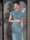 Vintage literarisches blaues Qipao Jacquard Baumwollkleid