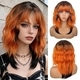 Orange kurze orange lockige synthetische Perücke mit Twist-Zöpfen