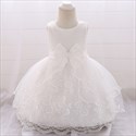Robe d'anniversaire pour fillette ornée de dentelle avec nœud